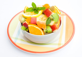 Obraz na płótnie Canvas Fruit salad on white