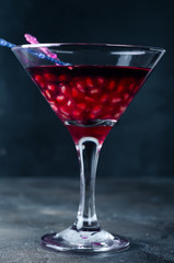 pomegranate cocktail and ripe red pomegranate fruit