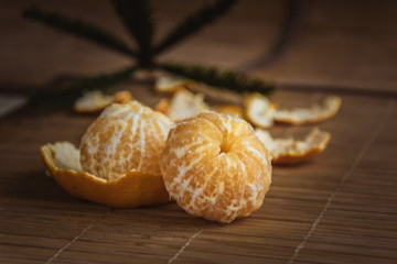 tangerines in snow on a wooden table, new year, a still life