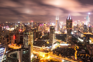 Fototapeta premium modern office buildings in shanghai at night