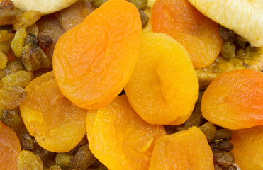 background of dried fruit, dried apricots, raisins, figs