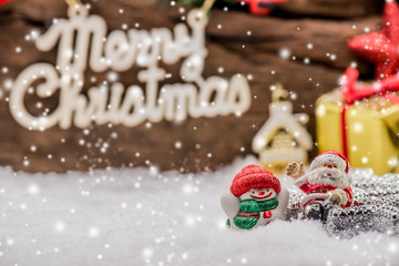 Fototapeta na wymiar Merry Christmas on snow, Xmas decoration, idea and concept