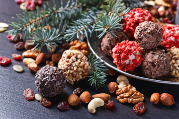 Homemade candy with chocolate , nuts and dried strawberry