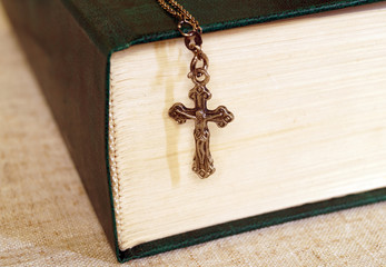 Bible and cross with Jesus