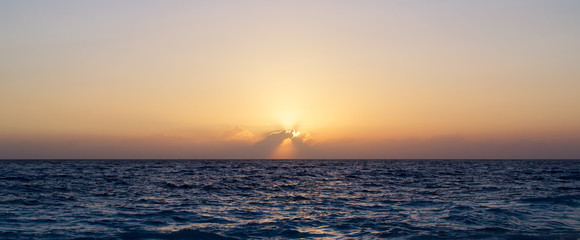 Sunset over the sea. Ocean sunset