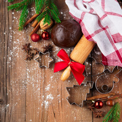 Gingerbread dough, cookie cutters and spices. Winter holiday concept. Selective focus