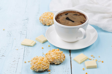 Cup coffee and homemade white chocolate sweets