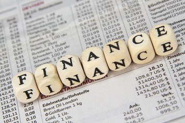 Finance word built with letter cubes
