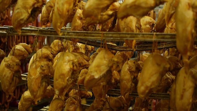 chicken drumsticks in a homemade smokehouse