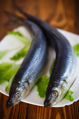 whole salted herring with lettuce