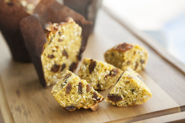 Healthy choice of banana and oat muffin with roasted almond flakes on top.