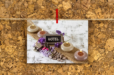 Business card with Hotel concept on a cork pinboard