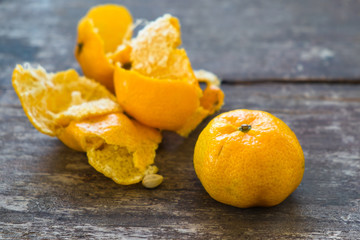 Mandarin orange on the wood table.