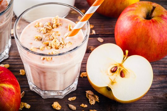 Healthy Breakfast: Smoothie With Granola, Red Apple And Yogurt