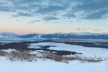 dramatic sunset colorful sky with illuminated red pink purple clouds Kurai Altai Siberia Russia