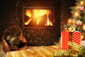 xmas tree fireplace and wooden desk space 