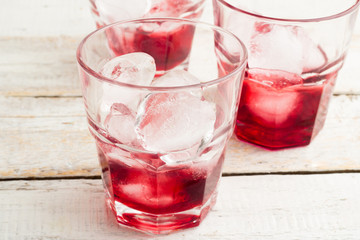 red drink with ice