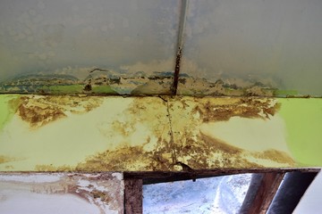 Water leaks on the ceiling Causing damage, the ceiling tiles and cement.