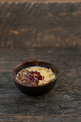 Breakfast bowl with fruits, nuts and seeds