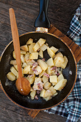 Fried potatoes with bacon