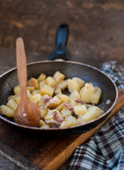 Fried potatoes with bacon