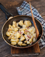 Fried potatoes with bacon
