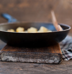 Fried potatoes with bacon