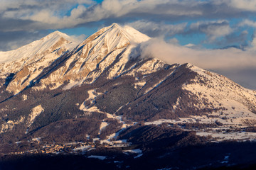 Sunset on the Petite and Grande Autane mountain peaks with view on Saint Leger Les Melezes....