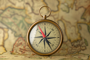 Antique Vintage Brass Compass on a Rare Map. 3d Rendering
