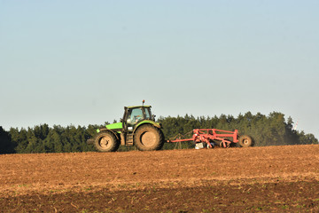work in the field plowing