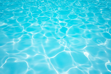 Naklejka na ściany i meble Beautiful Gentle wave in swimming pool with sun reflection