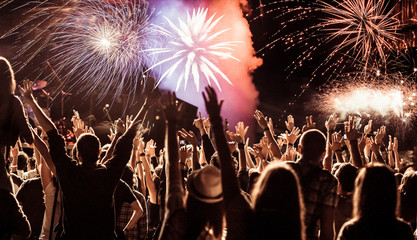 crowd watching fireworks at New Year