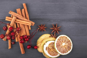 Christmas decoration with star anise, cinnamon with dry citrus a - 128276447