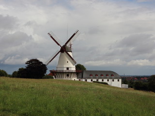 Fototapeta na wymiar Dybboel Mill Danish National Monument with Cloudy Sky