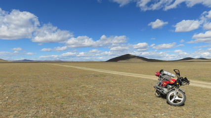 Fototapeta na wymiar Motorcycle adventure in the craziness of Mongolia