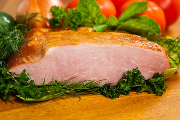 Piece of Smoked Carving Pork Ham. Selective and Soft focus.
