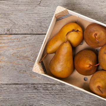Fresh Ripe Organic Pears on a Wooden Table. Selective focus.