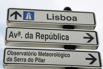 A road sign directing to Lisbon, Portugal