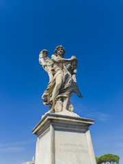 Fototapeta na wymiar Angel statue at Sant Angelo Bridge in Rome
