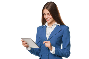 Attractive smiling girl in blue suit using tablet. Woman with tablet pc, isolated on white background