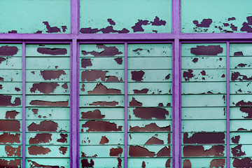 Purple and turquoise wall with peeling paint, Penang, Malaysia
