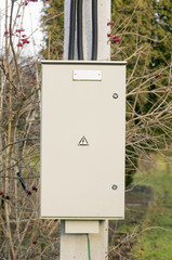 Electrical shield box on an electricity pole.