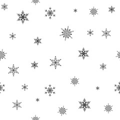 Seamless pattern of snowflakes on a white background