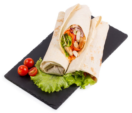 Shawarma with meat on a serving dish are isolated