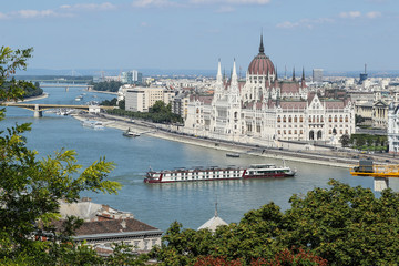 The blue Danube river with cruise ships, Budapest bridges, Parliament, landmarks - 128289660