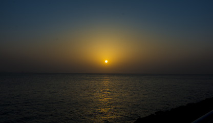Fototapeta premium Landscape with sea sunset