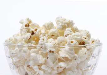 salty popcorn on a white background