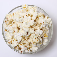 salty popcorn on a white background