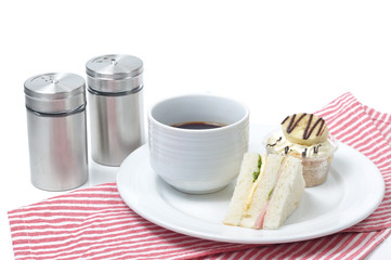 Coffee break set with sandwich and banana crumble cake