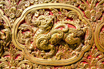 Close Up Beautiful StuccoThai Traditional Art Fantastic Beast or Animal(Lai Thai) Handmade Background Wallpaper Texture